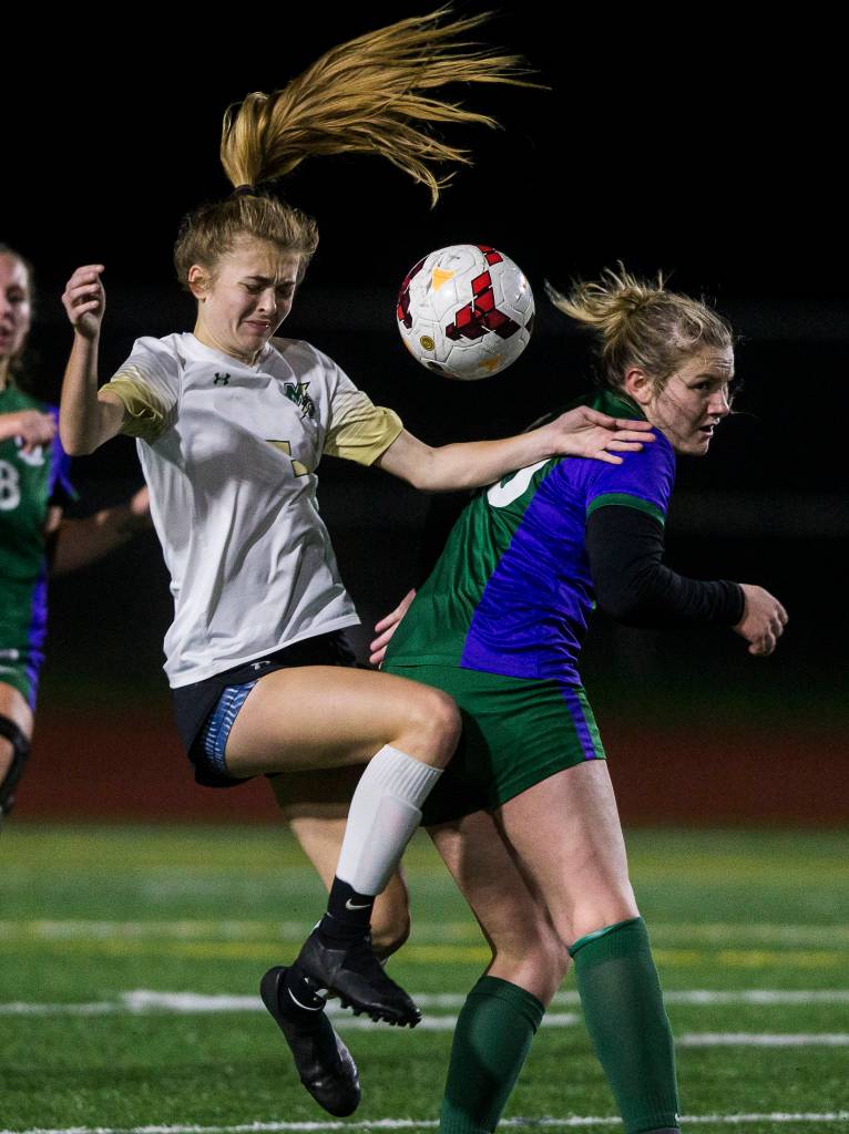 Marysville-Getchells Jadin Thompson-Sheldon jumps up for the ball during the district semifinal game on Nov. 5, 2019 in Edmonds, Wash. (Olivia Vanni / The Herald)