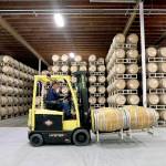 Barrels of wine are moved into storage at the Chateau Ste. Michelle winery in Woodinville. (AP Photo/Elaine Thompson)