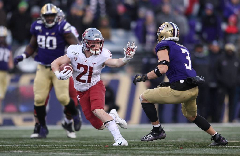 Washington State Cougars running back Max Borghi breaks open for a run. The Washington State University Cougars lost 31-13 to the University of Washington Huskies in the 112th Apple Cup at Husky Stadium on Friday, Nov. 29, 2019 in Seattle, Wash. (Andy Bronson / The Herald)                                Washington State Cougars running back Max Borghi breaks open for a run. The Washington State University Cougars lost 31-13 to the University of Washington Huskies in the 112th Apple Cup at Husky Stadium on Friday, Nov. 29, 2019 in Seattle, Wash. (Andy Bronson / The Herald)