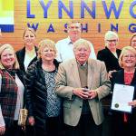 Citizen award winner Loren Simmonds, a Lynnwood resident and former council member, is pictured with his family and Council Vice President Christine Frizzell. (City of Lynnwood)