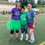 Megan Wolfe (left), executive director of Girls on the Run of Snohomish County, with participant Marlen Mercado-Ayala, 12, and Marlens mother, Laura Mercado-Ayala. (Girls on the Run)