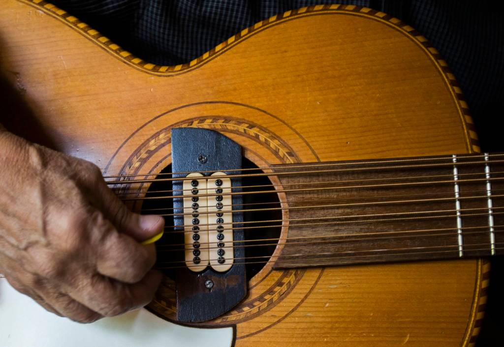 Barcos parents, who were migrant farmworkers, gave him his first guitar when he was very young. (Olivia Vanni / The Herald)                                Barcos parents, who were migrant farmworkers, gave him his first guitar when he was very young. (Olivia Vanni / The Herald)