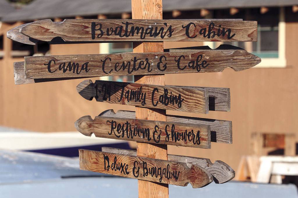 Directional signs guide visitors at Cama Beach Historical State Park. (Kevin Clark / The Herald)