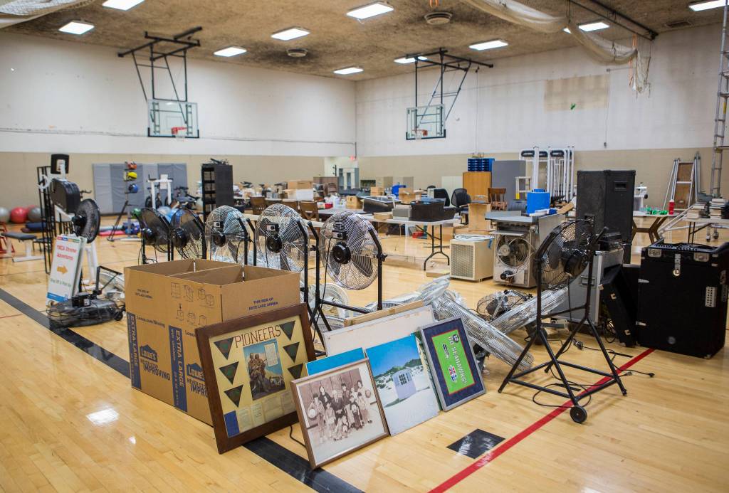 An array of items that will be for sale sit in one of the gyms at the Everett Family Branch YMCA on Wednesday in Everett. (Olivia Vanni / The Herald)
