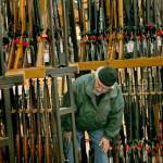 A man looks at the shotgun section of Cabelas while shopping on Black Friday in Hazelwood, Missouri. The number of background checks conducted by federal authorities is on pace to break a record by the end of this year. (Christian Gooden/St. Louis Post-Dispatch via AP)
