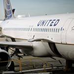 A United Airlines aircraft sits at a gate at OHare International Airport in Chicago on Oct. 17. (Daniel Acker/Bloomberg)