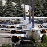 In this Aug. 15 photo, three grounded Boeing 737 Max airplanes, built for Icelandair, sit parked in a lot normally used for cars in an area adjacent to Boeing Field, in Seattle. (AP Photo/Elaine Thompson, File)