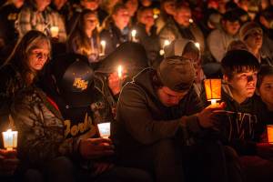 Candlelight vigil for slain Forks teen fills school stadium