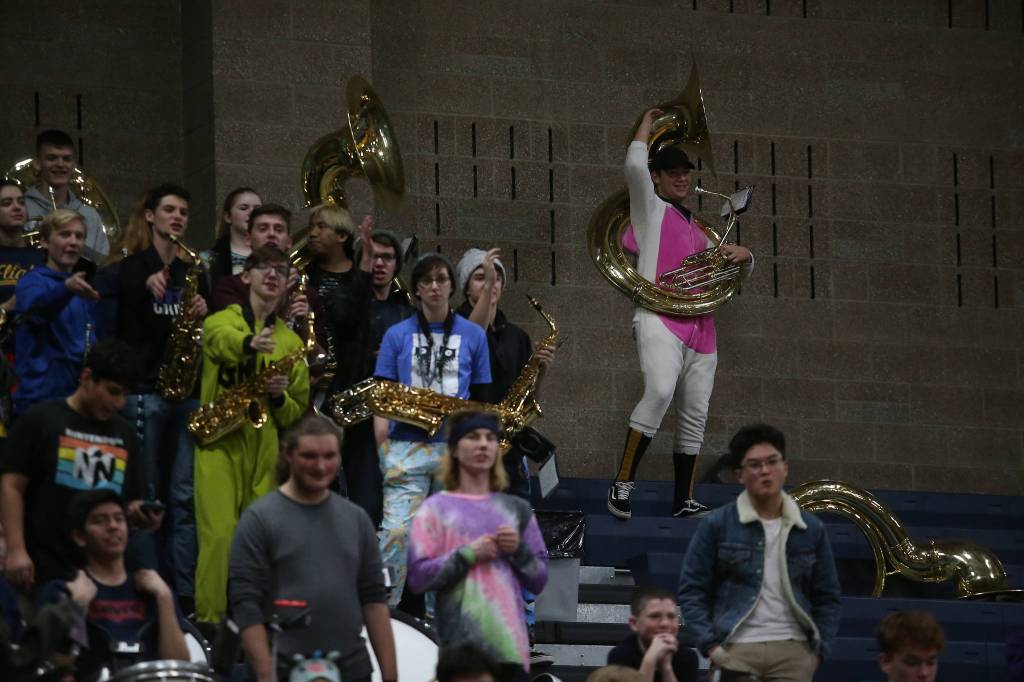 Arlington fans yell for their team. The Arlington Eagles lost to the Lake Stevens Vikings 57-54 in a girls basketball game on Friday, Dec. 6, 2019 in Arlington, Wash. (Andy Bronson / The Herald)