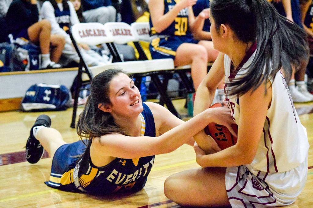 Everetts Kayla Lay (left) battles Cascades Yaritza Pelayo for the ball during the city rivals annual BruGull Fest game Friday at Cascade High School in Everett. (Katie Webber / The Herald)