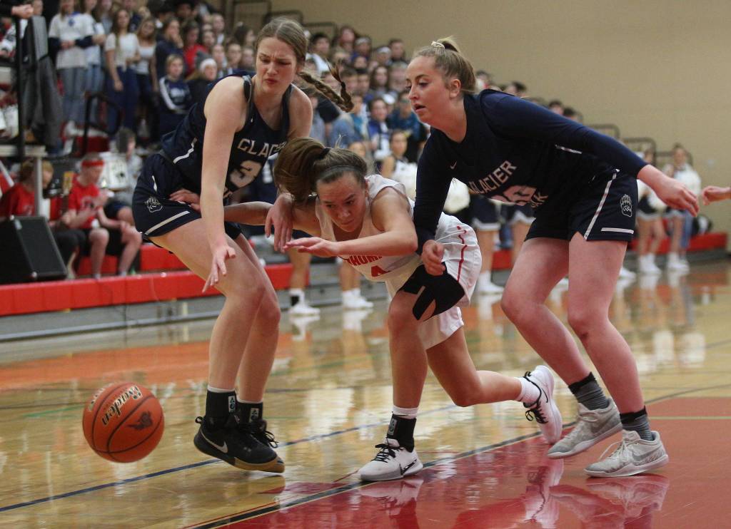 Snohomishs Kinslee Gallatin loses the ball while defended as Snohomish lost to Glacier Peak 50-39 in a non-league girls basketball game on Monday, Dec. 9, 2019 in Snohomish, Wash. (Andy Bronson / The Herald)