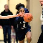 Glacier Peaks Aaliyah Collins steals the ball from Snohomishs Cheyenne Rodgers as Glacier Peak beat Snohomish 50-39 in a non-league girls basketball game on Dec. 9 in Snohomish. (Andy Bronson / The Herald)