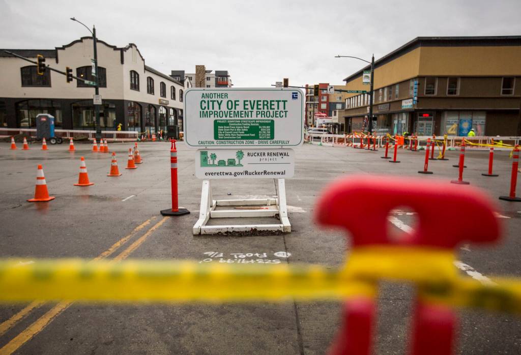 Traffic cones and yellow caution tape help guide pedestrians about where theyre able to walk during construction. (Olivia Vanni / The Herald)
