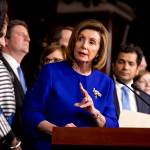 House Speaker Nancy Pelosi, D-California, accompanied by Democratic House members speaks at a news conference to discuss the United States-Mexico Canada-Agreement on trade, Tuesday on Capitol Hill in Washington. (Andrew Harnik / Associated Press)