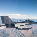 An EA-18G Growler with VAQ-138 from NAS Whidbey Island flies above Washington State.(U.S. Navy)