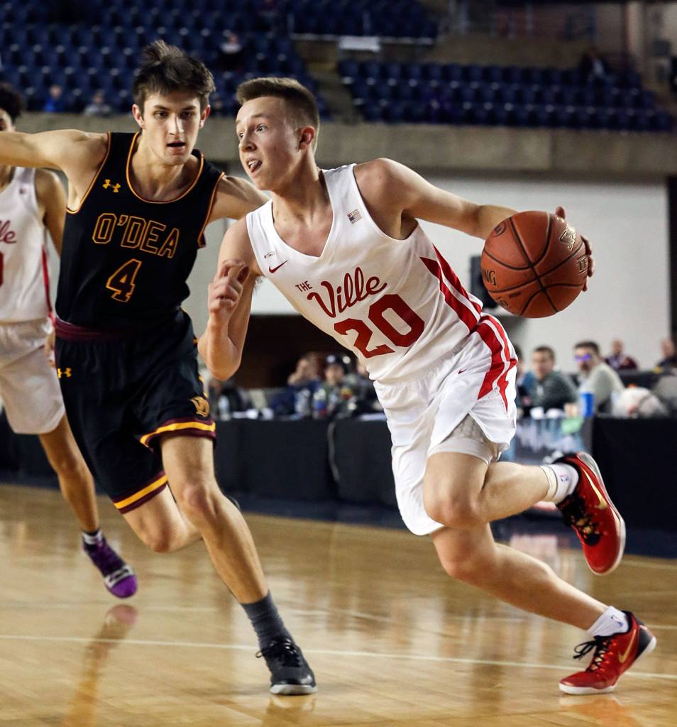 Luke Dobler, pictured in last seasons state quarterfinal against ODea, is a talented and experienced senior guard for the Tomahawks. (Kevin Clark / The Herald)