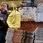 In this 2007 photo, Wilbur Hathaway makes change for a customer at First and Pike News in Seattles Pike Place Market, back when there were two daily Seattle newspapers, The Seattle Times and the Seattle Post-Intelligencer. (AP Photo/Elaine Thompson, file)