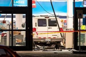 Van crashes into crowded store near Seattle, injuring 11