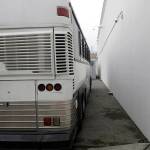 A bus used to transport detainees is shown parked during a media tour of the U.S. Immigration and Customs Enforcement detention center on Monday in Tacoma. (AP Photo/Ted S. Warren)