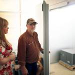 Tari Dexter (left) and Bill Dexter inspect new equipment for their crematorium in Stanwood earlier this year. (Julia-Grace Sanders / The Herald)