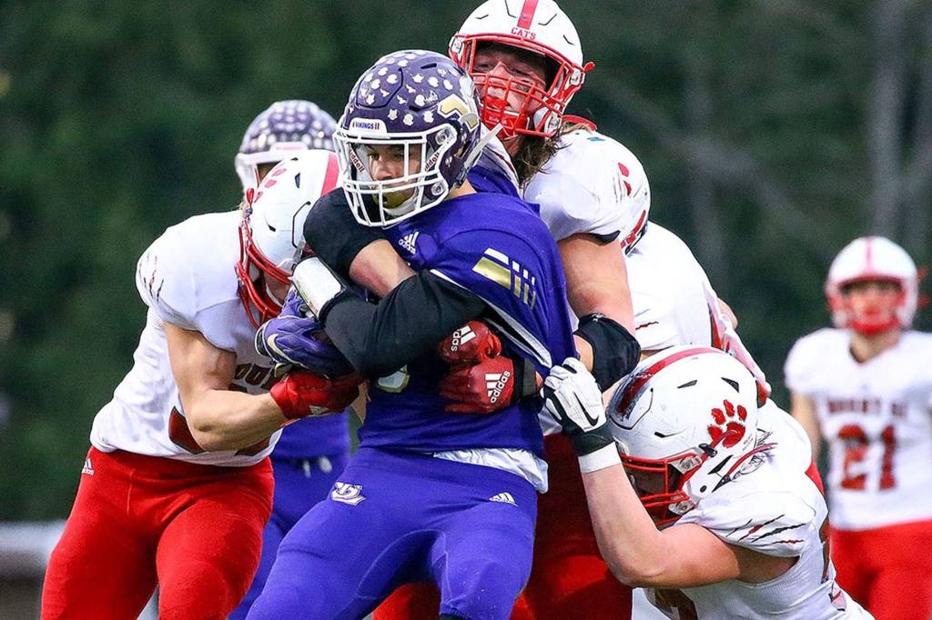 Lake Stevens Dallas Landeros is stood up on a rush attempt during a game against Mount Si on Nov. 23, 2019, at Lake Stevens High School. (Kevin Clark / The Herald)