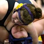 Marysville Pilchucks Alivia White wrestles and pins Arlingtons Brianna Williams-Bales Wednesday evening at Arlington High School in Arlington on December 18, 2019. Arlington won 60-18. (Kevin Clark / The Herald)