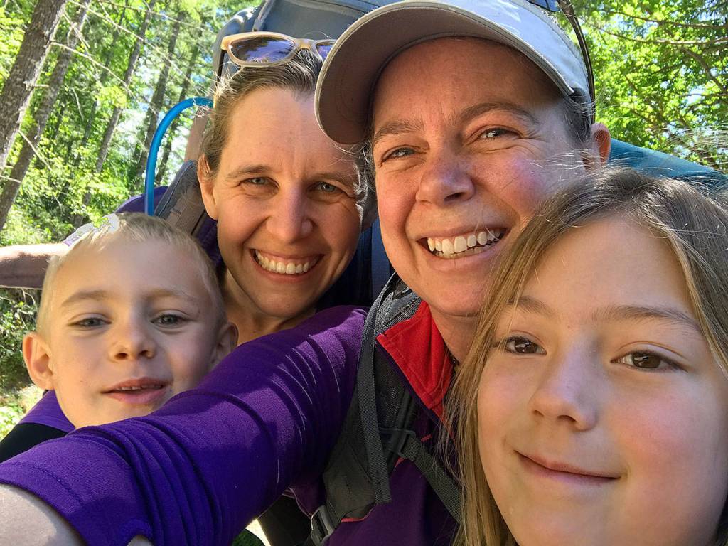 Quinn Allen, Stephanie Allen, Jessi Loerch and Hazel Loerch take a backpacking trip to Glacier Lake near Mount Rainier. A highlight for the kids is looking for frogs at the lake. (Washington Trails Association)