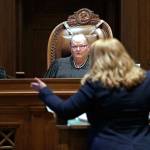 Justice Charles Johnson, Chief Justice Mary Fairhurst (center) and Justice Barbara Madsen, listen as Michele Earl-Hubbard, an attorney for a media coalition led by The Associated Press, speaks during a hearing before the Washington Supreme Court, on June 11, in Olympia, regarding whether state lawmakers are subject to the same disclosure rules that apply to other elected officials under the voter-approved Public Records Act. The court ruled Thursday that the Public Records Act does fully apply to state lawmakers, in a 7-2 decision. (Elaine Thompson / Associated Press file photo)