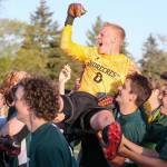 Shorecrests Gavin Dalziel is lifted in celebration for his performance against Snohomish during the NW District 1 3A Boys Soccer Tournament at Shoreline Stadium on May 9. The Scots won 3-2. (Kevin Clark / The Herald)