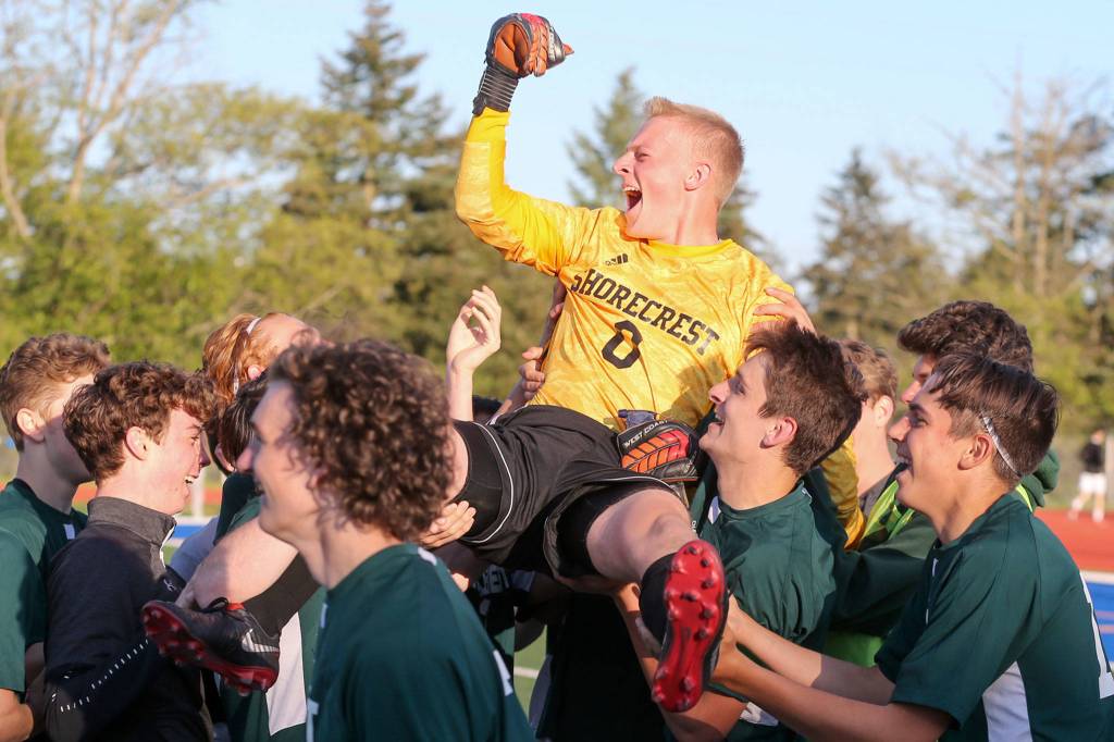 Shorecrests Gavin Dalziel is lifted in celebration for his performance against Snohomish during the NW District 1 3A Boys Soccer Tournament at Shoreline Stadium on May 9. The Scots won 3-2. (Kevin Clark / The Herald)