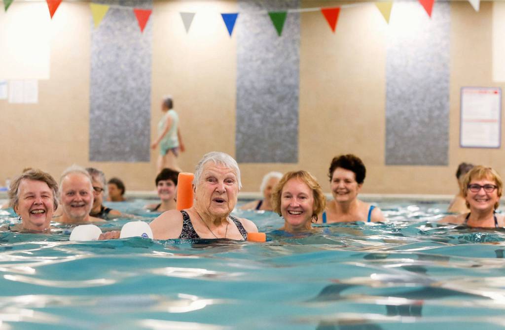 For her 100th birthday party, Teresa Schmierer celebrated at Everetts 24 Hour Fitness with her water aerobics class. (Dan Bates / The Herald)