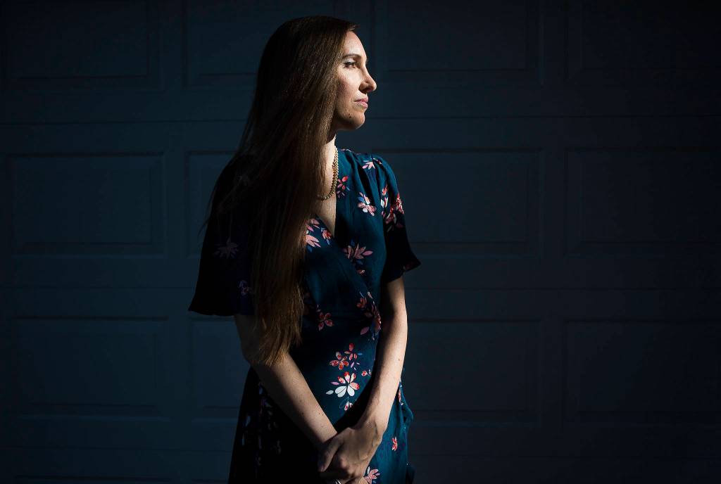 When Chelsea Rustad won an AncestryDNA kit and submitted her sample she had no idea she would be the key to finding the killer in a 1987 double murder. Rustads sample led to the arrest and conviction of her second cousin William Talbott II, making it the first court case to test law enforcements use of genetic genealogy to identify suspects. Chelsea Rustad is seen here in front of her home in on July 22 in Tumwater. (Olivia Vanni / The Herald)