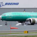 A Boeing 737 Max 8 lands after a test flight at Boeing Field in Seattle last April. (AP Photo/Ted S. Warren, File)