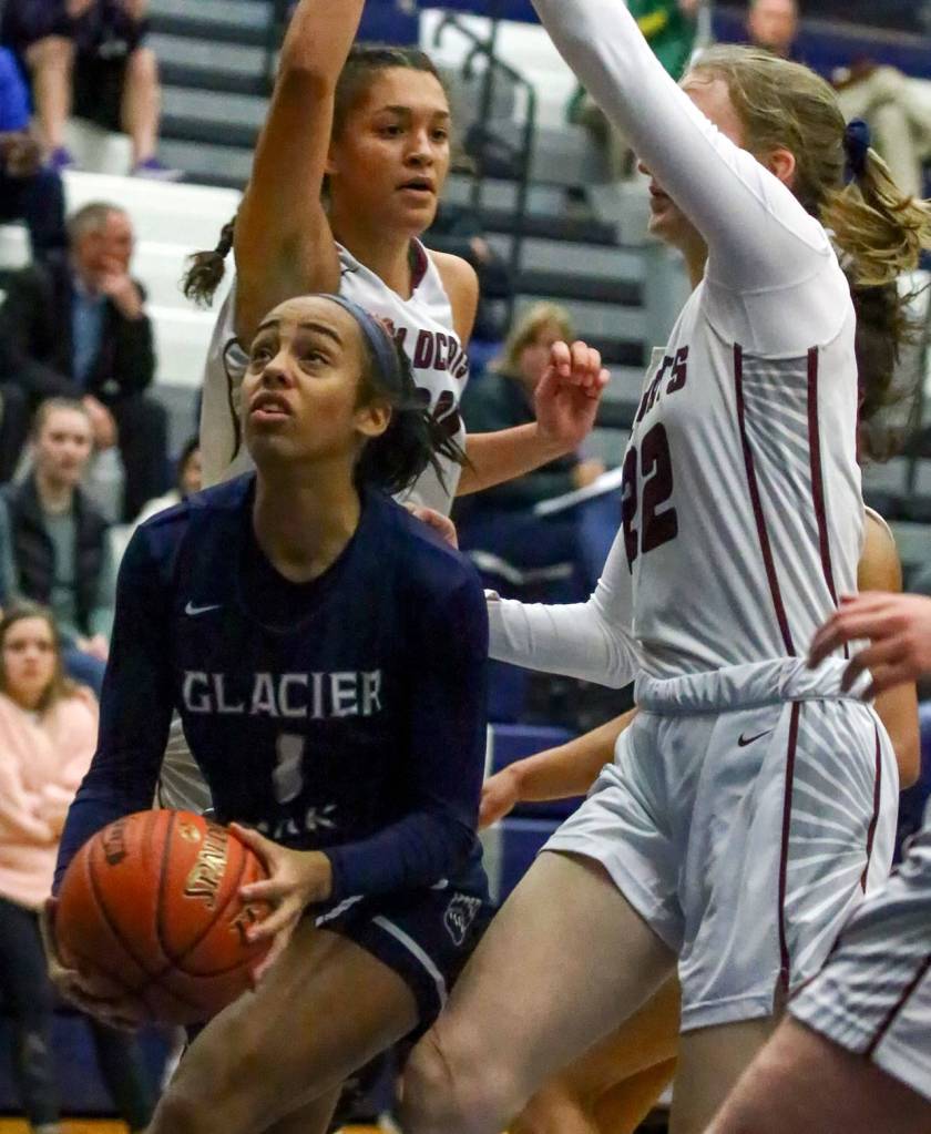 Glacier Peaks Aaliyah Collins looks to shoot against Mt. Spokane Friday evening at Glacier Peak High School in Snohomish on December 27, 2019. (Kevin Clark / The Herald)