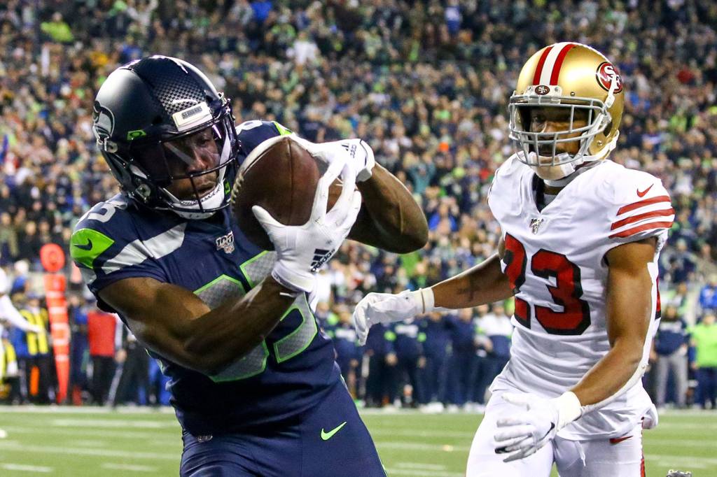 Seattle Seahawks David Moore makes a touchdown reception but is waved off due to a penalty Sunday evening at CenturyLink Field in Seattle on December 29, 2019. The 49ers won 26-21. (Kevin Clark / The Herald)