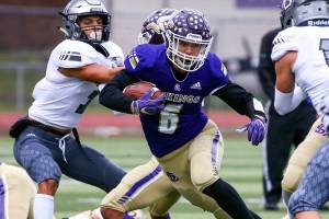 Lake Stevens senior running back Dallas Landeros was one of 11 local high school football players who received Associated Press all-state honors. (Kevin Clark / The Herald)