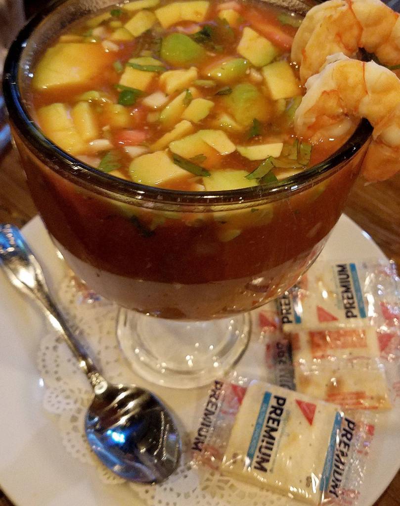 The coctel de camarones at Santa Fe Mexican Grill features shrimp, avocado, onions, tomatoes and cilantro in a tomato broth. (Sharon Salyer / The Herald)