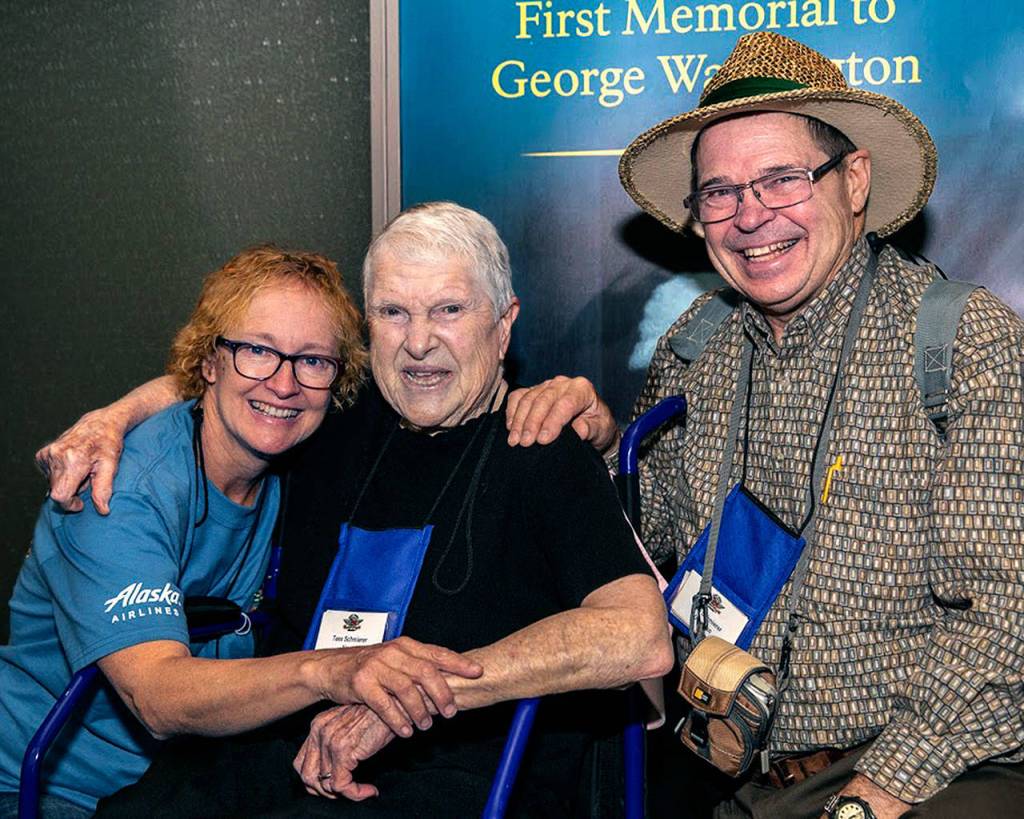 Kim Pontrello (left) with her 100-year-old friend, Teresa Schmierer, and the older womans son, Mike Schmierer, during their trip to Washington, D.C., last September with Puget Sound Honor Flight. The nonprofit organization provides free trips for military veterans to visit the nations memorials. (Puget Sound Honor Flight)