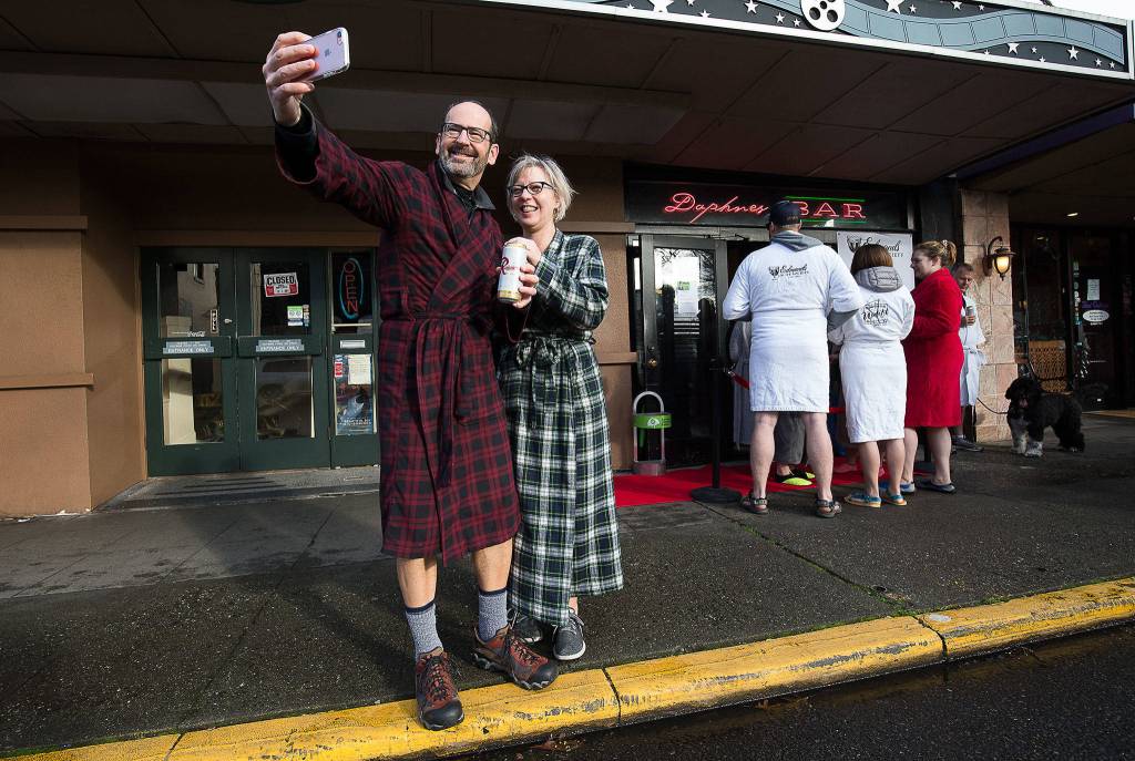 At a gathering at Daphnes Bar, Chris and Valerie Kelley take a selfie before joining in the annual Polar Bear Plunge. (Andy Bronson / The Herald)