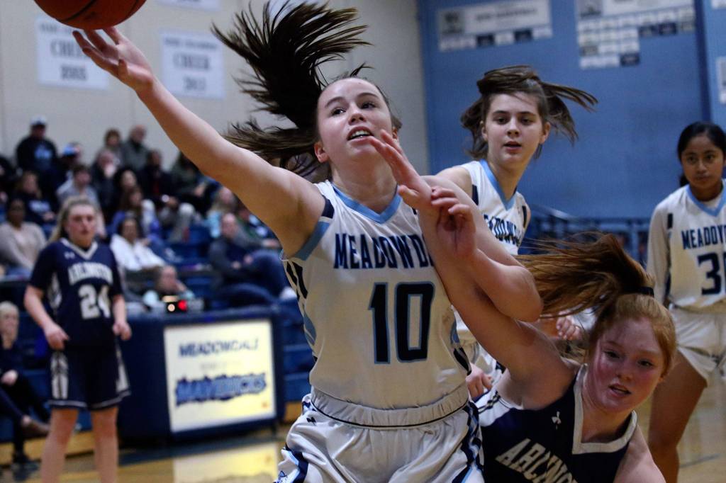 Arlington defeated Meadowdale 61-40 Friday evening at Meadowdale High School in Lynnwood on January 3, 2020. (Kevin Clark / The Herald)