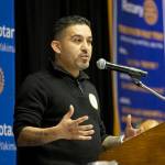 Chevy Cortez speaks to the Downtown Rotary Club about his time as a gang member and his organization The Love Project on Jan. 2 at the Yakima Convention Center in Yakima. (Evan Abell / Yakima Herald-Republic)