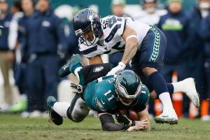 The Seattle Seahawks and Philadelphia Eagles are both missing several key players because of injury for their wild card playoff game Sunday in Philadelphia. (AP Photo/Michael Perez)