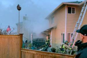 Woman dies after crashing car into Mountlake Terrace home