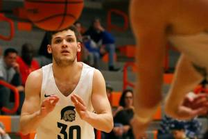 Bobby Martin, freshman at Everett Community College, receives a pass Thursday evening at the Walt Price Fitness Center in Everett on January 2, 2020. (Kevin Clark / The Herald)