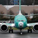 In this Dec. 11, 2019 photo, a Boeing 737 Max airplane being built for Norwegian Air International turns as it taxis for take off for a test flight at Renton Municipal Airport in Renton. (AP Photo/Ted S. Warren, File)