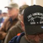 Bob Klima stands near the doorway as residents continue to file in for a Nelson County Board of Supervisors meeting at the Liberty High School auditorium in Lynchburg, Va., on Dec. 9, addressing a resolution to make the county a Second Amendment sanctuary. The board approved the sanctuary resolution Monday night at a meeting attended by more than 1,000 residents. (Emily Elconin/ The News Advance)