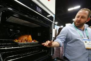 Kitchens get smarter at CES tech show, not yet in many homes