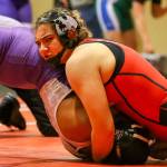 Snohomishs Alycia Pidgeon work to pin Edmonds-Woodways Destinee Harris during a girls wrestling scramble on Jan. 8, 2020, at Snohomish High School. (Kevin Clark / The Herald)