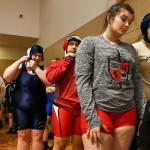 Scenes from a high school girls wrestling scramble