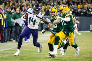 Matt Ludtke / Associated Press                                Seattle wide receiver DK Metcalf runs after a catch during the second half of Sundays NFC playoff game in Green Bay.
